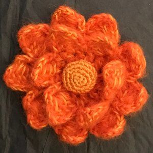 Orange handmade crocheted flower brooch pin